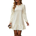 Long Sleeve Quilted Dress with Puff Shoulder Detail and Ruffled Hem